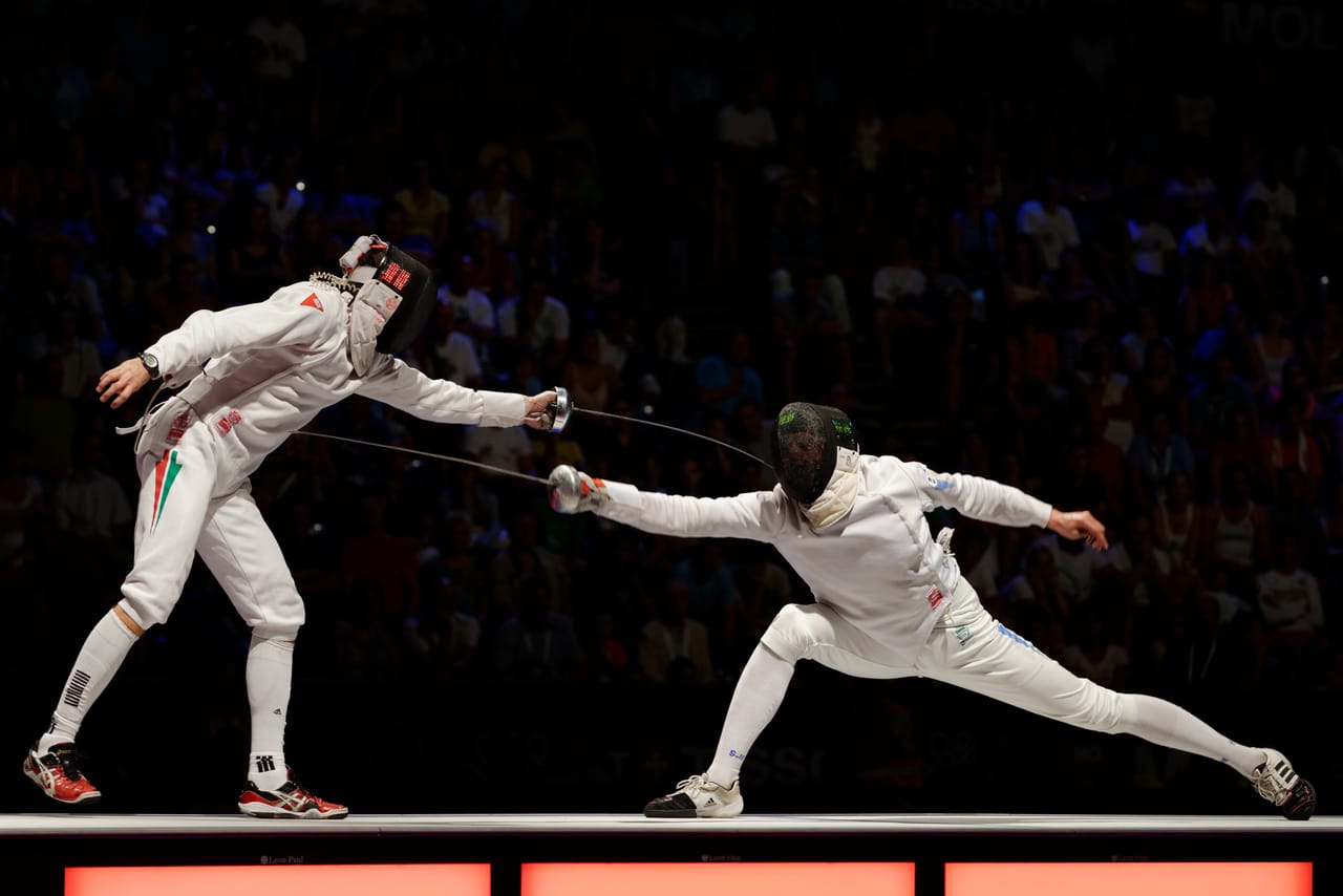 Epee fencers in team World Championship final bout